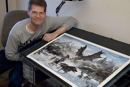 Artist Brad Fraunfelter and his "Forbidden Valley" cover artwork.